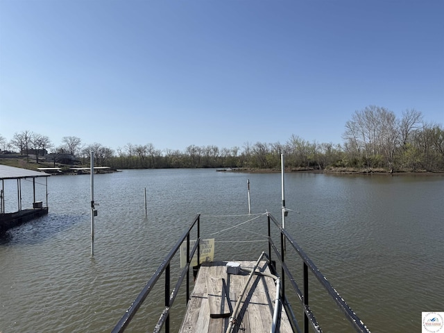 view of dock with a water view