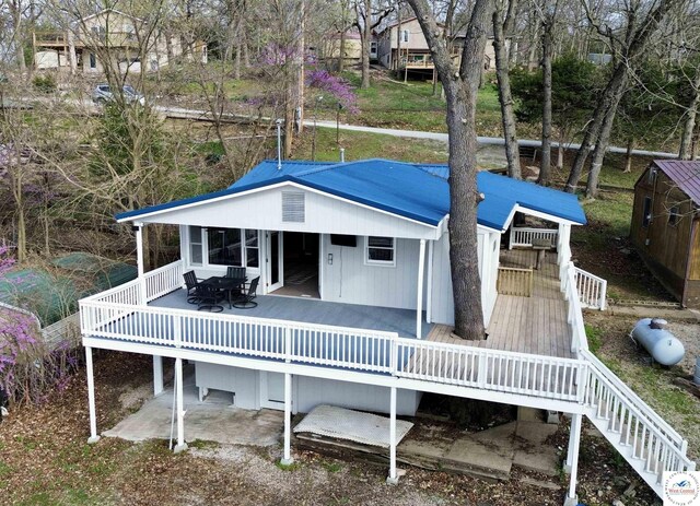 19242 Quail Rd, Warsaw, MO 65355 - rear view of property with a wooden deck