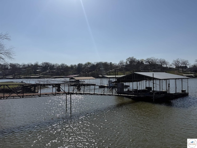 dock area featuring a water view