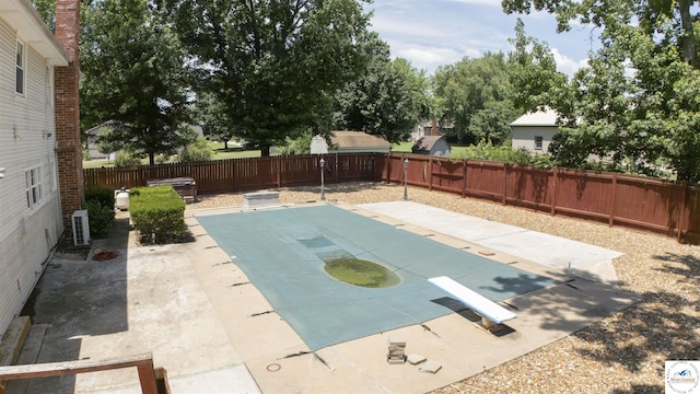 1903 E Alfresco St, Clinton, MO 64735 - view of swimming pool with a fenced backyard and a patio area