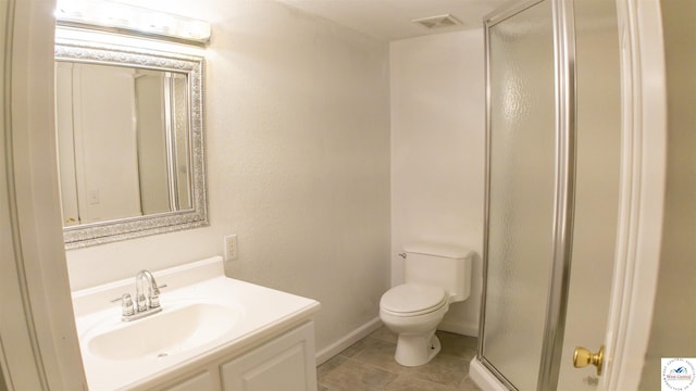 1903 E Alfresco St, Clinton, MO 64735 - full bath featuring a stall shower, vanity, and tile patterned floors