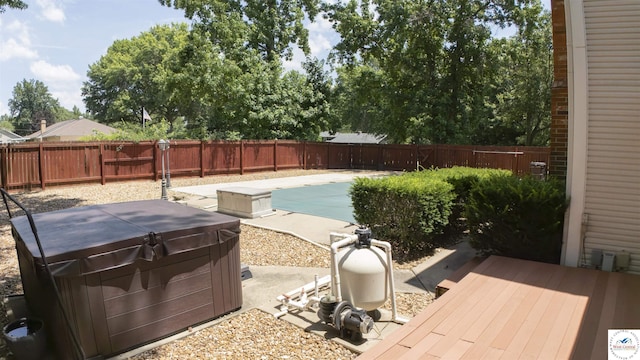 1903 E Alfresco St, Clinton, MO 64735 - view of pool featuring a hot tub, a fenced backyard, and a wooden deck