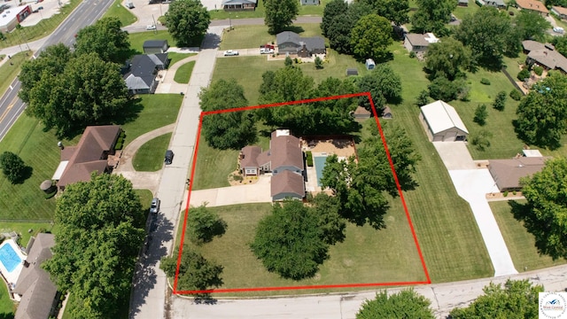 1903 E Alfresco St, Clinton, MO 64735 - aerial view of residential area with property parcel outlined