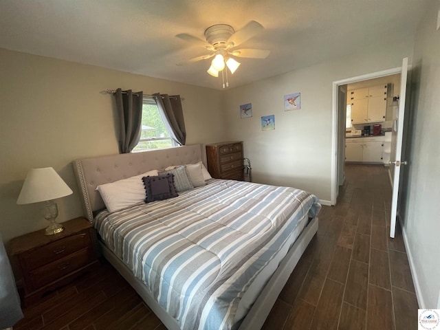 26835 Carefree Ln, Warsaw, MO 65355 - bedroom with dark wood-style flooring, baseboards, and a ceiling fan