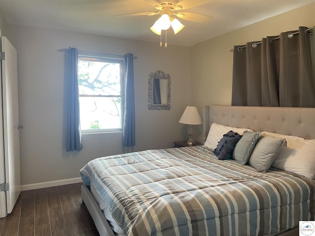 26835 Carefree Ln, Warsaw, MO 65355 - bedroom featuring baseboards, dark wood-style floors, and ceiling fan