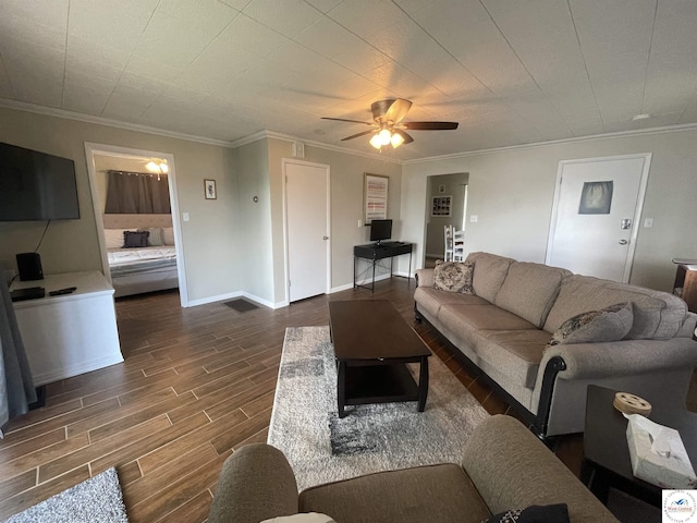 26835 Carefree Ln, Warsaw, MO 65355 - living area featuring wood finished floors, crown molding, a ceiling fan, and baseboards