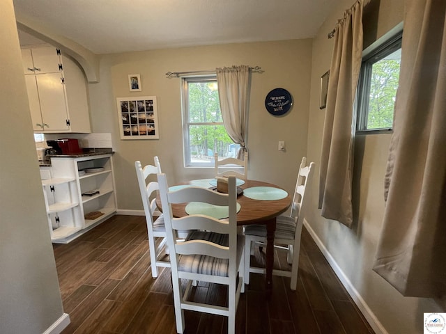 26835 Carefree Ln, Warsaw, MO 65355 - dining area with baseboards and dark wood finished floors