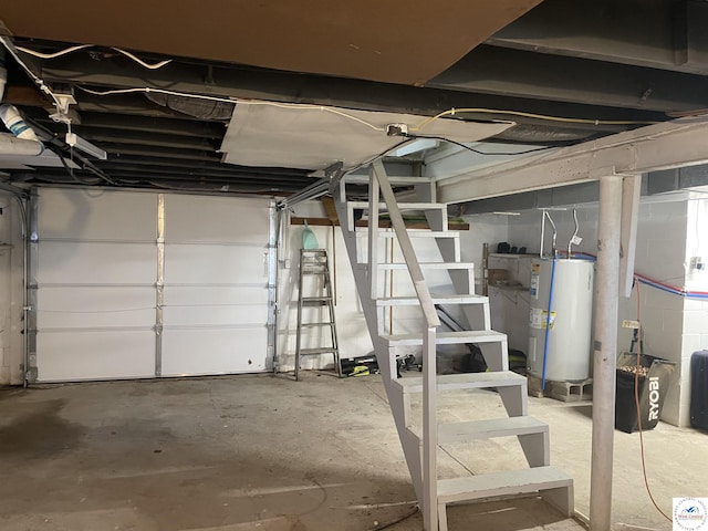 26835 Carefree Ln, Warsaw, MO 65355 - unfinished basement featuring water heater and stairs