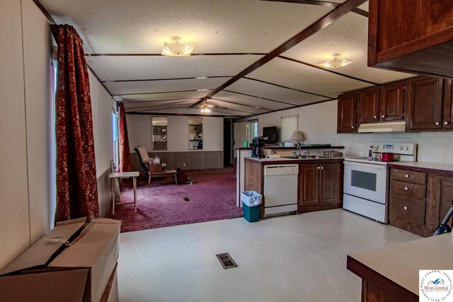386 SE 1151st Rd, Clinton, MO 64735 - kitchen with white appliances, under cabinet range hood, a sink, brown cabinetry, and a textured ceiling