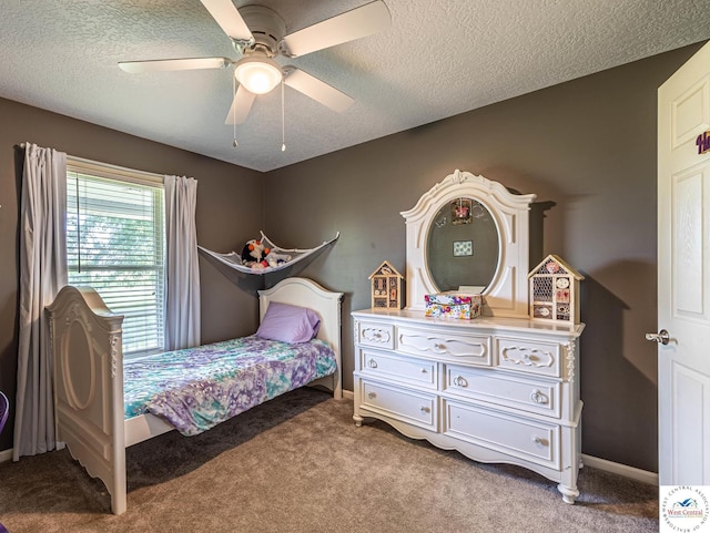 1766 NW M Hwy, Clinton, MO 64735 - carpeted bedroom with a textured ceiling and ceiling fan