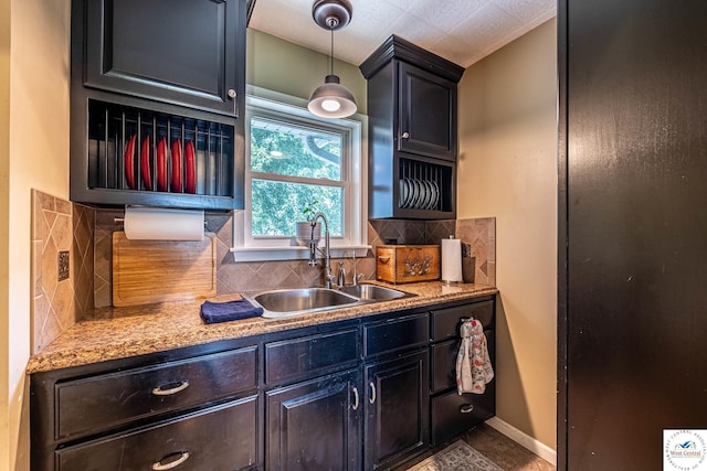 1766 NW M Hwy, Clinton, MO 64735 - kitchen with backsplash, hanging light fixtures, and tile patterned flooring