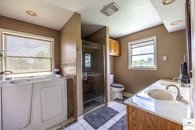 1766 NW M Hwy, Clinton, MO 64735 - bathroom with a stall shower, double vanity, a garden tub, tile patterned flooring, and a textured ceiling