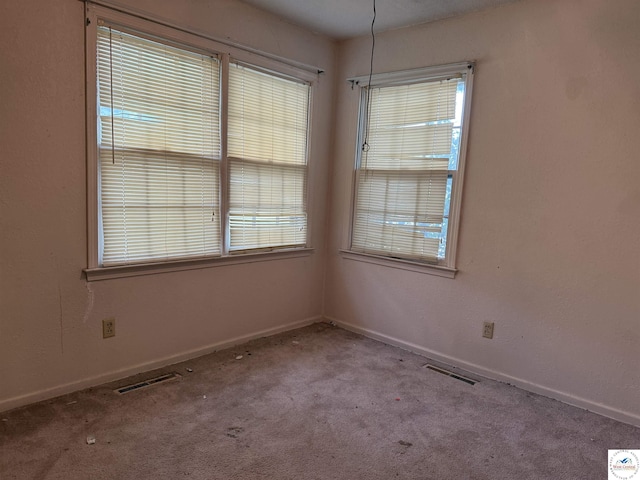 210 Salem Ave, Knob Noster, MO 65336 - carpeted spare room with baseboards