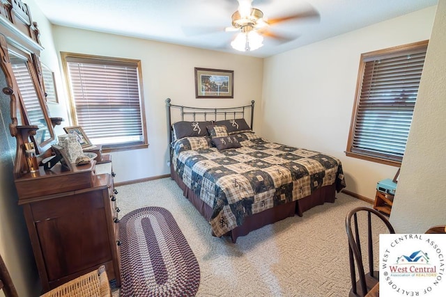 662 W 6th St, Schell City, MO 64783 - carpeted bedroom featuring baseboards and ceiling fan