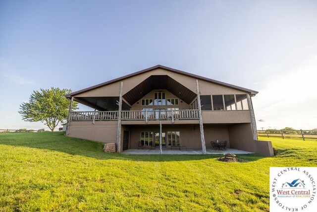 662 W 6th St, Schell City, MO 64783 - rear view of house with a lawn, a patio, and a deck
