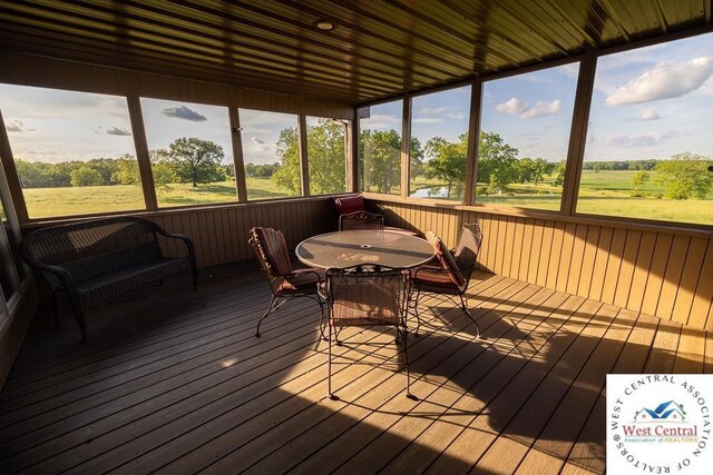 662 W 6th St, Schell City, MO 64783 - sunroom with outdoor dining area