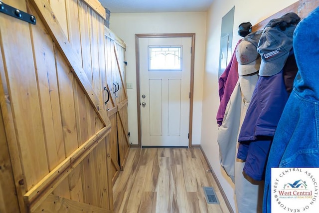 662 W 6th St, Schell City, MO 64783 - entryway featuring wood finished floors