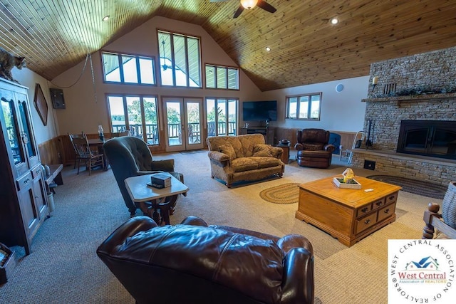 662 W 6th St, Schell City, MO 64783 - carpeted living area featuring high vaulted ceiling, a fireplace, a ceiling fan, plenty of natural light, and recessed lighting