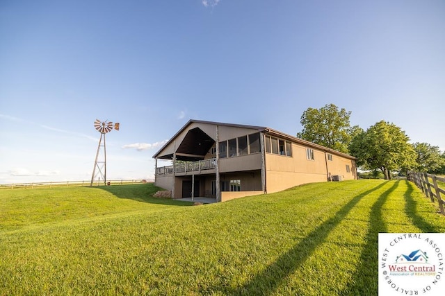 662 W 6th St, Schell City, MO 64783 - rear view of property with central AC unit