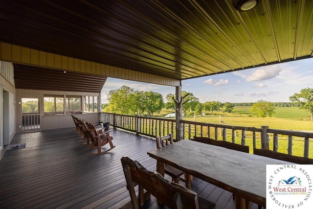 662 W 6th St, Schell City, MO 64783 - wooden terrace with outdoor dining area