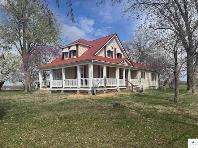farmhouse-style home featuring covered porch and a front lawn