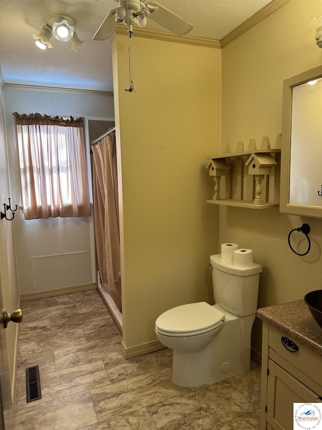 full bathroom with a shower with curtain, toilet, visible vents, ornamental molding, and a textured ceiling