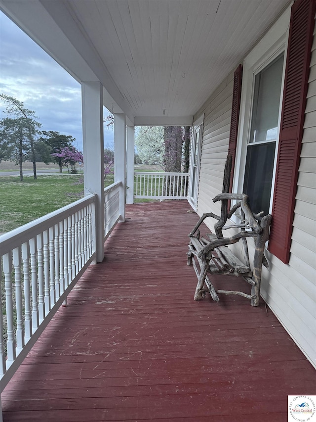 wooden deck featuring a porch
