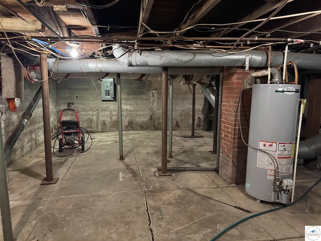 unfinished basement with electric panel and water heater
