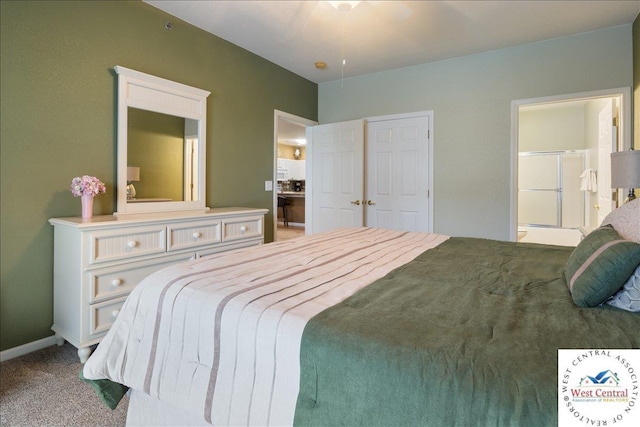 748 Pershing Dr, Camdenton, MO 65020 - carpeted bedroom featuring ensuite bath