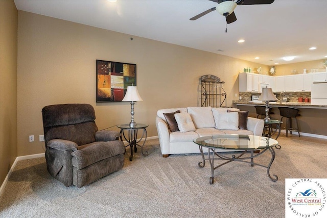 748 Pershing Dr, Camdenton, MO 65020 - living area featuring ceiling fan, light colored carpet, and baseboards