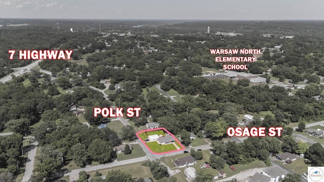 416 W Osage St, Warsaw, MO 65355 - aerial view of property's location with property boundaries highlighted and a heavily wooded area