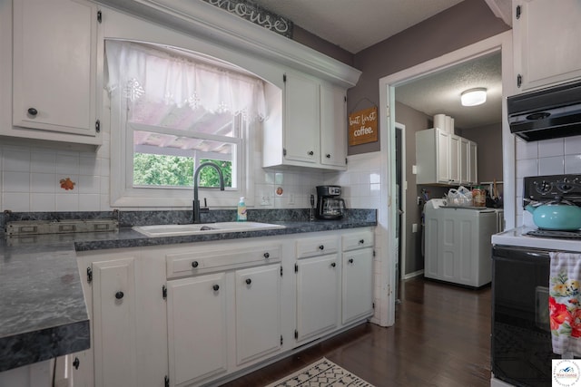 416 W Osage St, Warsaw, MO 65355 - kitchen featuring electric range, white cabinets, and tasteful backsplash