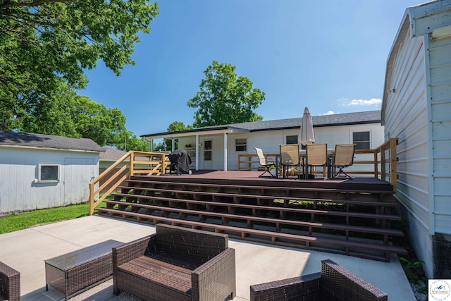 416 W Osage St, Warsaw, MO 65355 - back of house with outdoor dining space and a wooden deck