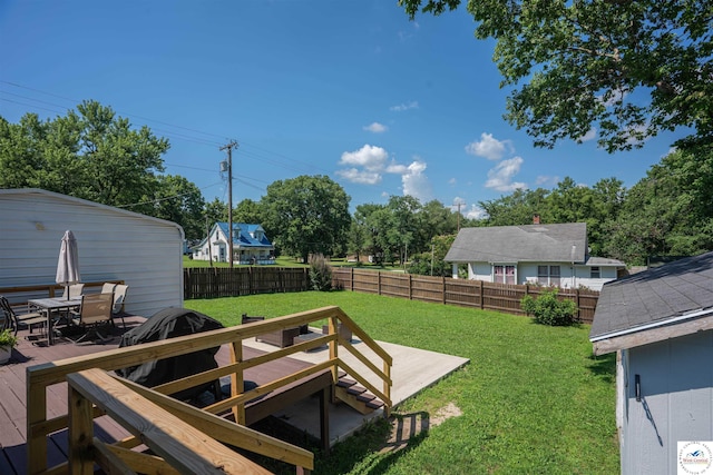 416 W Osage St, Warsaw, MO 65355 - fenced backyard with outdoor dining space and a wooden deck
