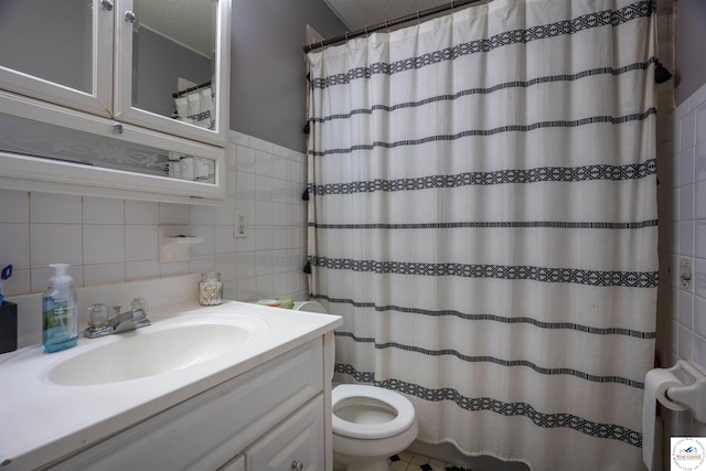 416 W Osage St, Warsaw, MO 65355 - bathroom featuring tile walls, vanity, and a shower with shower curtain