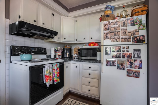 416 W Osage St, Warsaw, MO 65355 - kitchen featuring white appliances, under cabinet range hood, white cabinets, decorative backsplash, and dark countertops