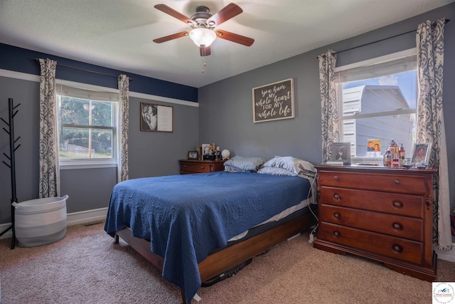 416 W Osage St, Warsaw, MO 65355 - carpeted bedroom with a ceiling fan