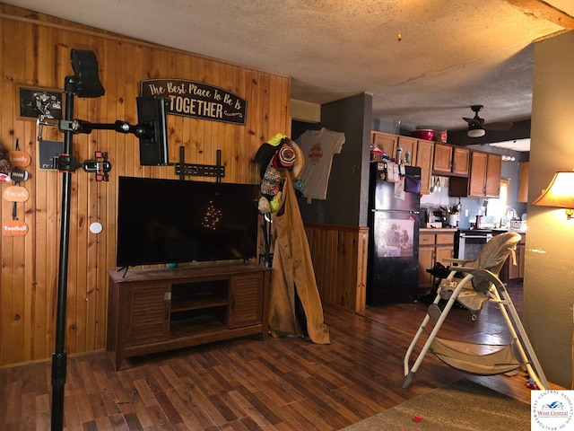 31591 Spring Ave, Warsaw, MO 65355 - living area with wood walls, a textured ceiling, and wood finished floors