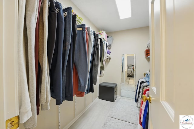 1515 NW Primrose Ln, Blue Springs, MO 64015 - spacious closet featuring wood finished floors