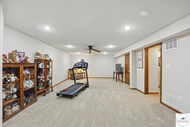 1515 NW Primrose Ln, Blue Springs, MO 64015 - workout area featuring light colored carpet, recessed lighting, baseboards, and a ceiling fan