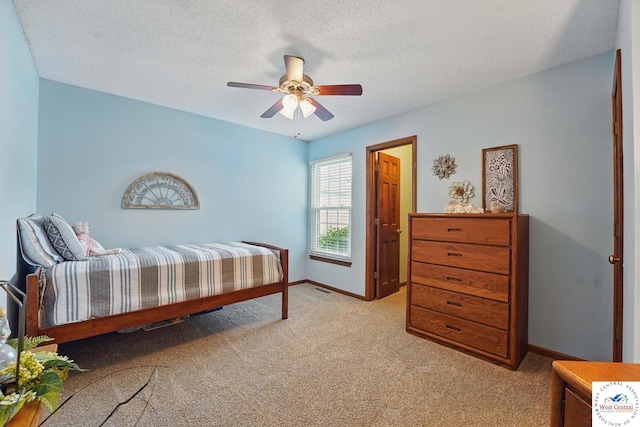 1515 NW Primrose Ln, Blue Springs, MO 64015 - bedroom featuring carpet, baseboards, a textured ceiling, and a ceiling fan