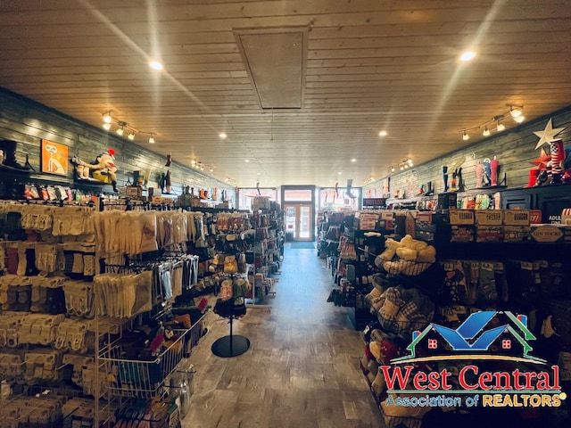 104 E Main St, Cole Camp, MO 65325 - miscellaneous room with wooden ceiling, wood finished floors, and expansive windows