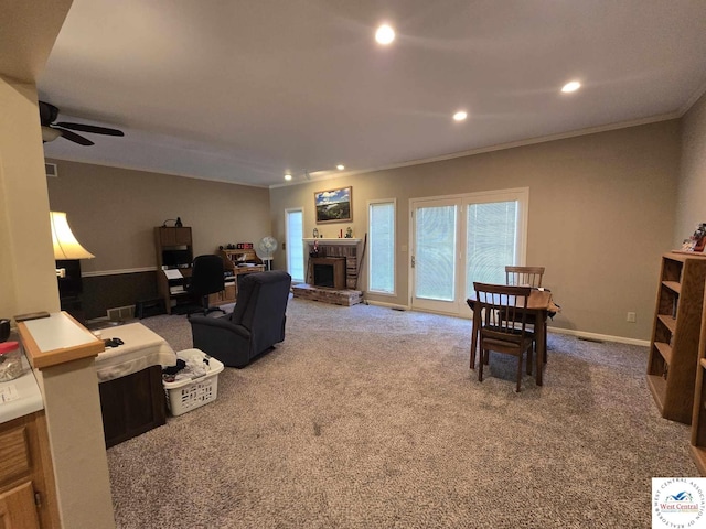 1017 E Trevino Rd, Clinton, MO 64735 - living area featuring crown molding, recessed lighting, a ceiling fan, and carpet flooring