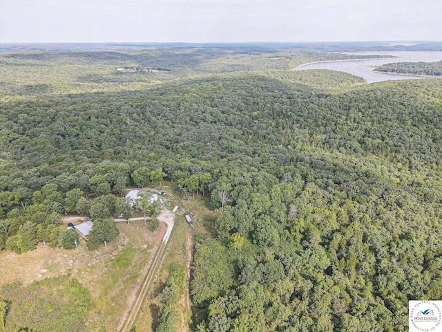 aerial view featuring a forest view