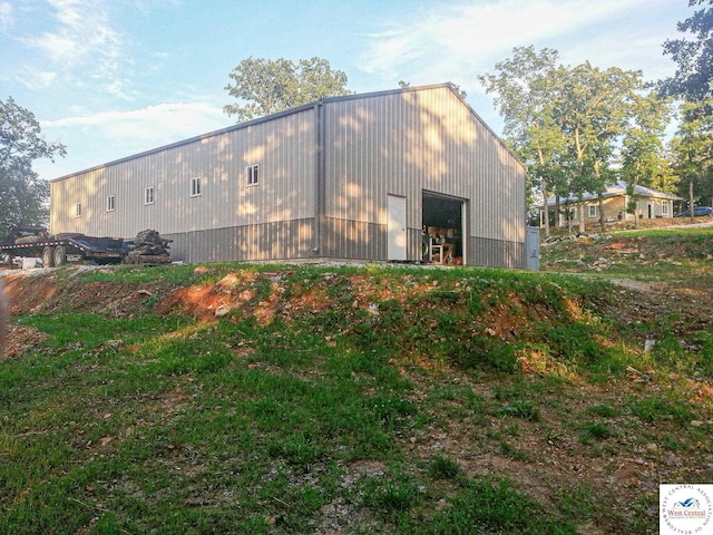 exterior space with a detached garage