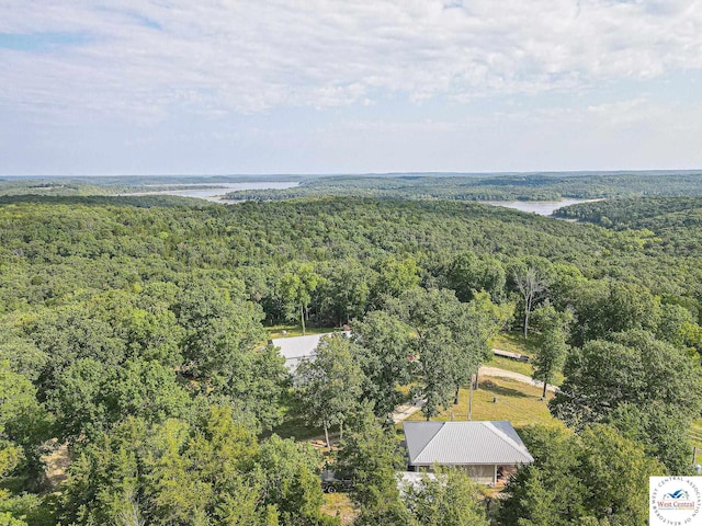 bird's eye view featuring a wooded view