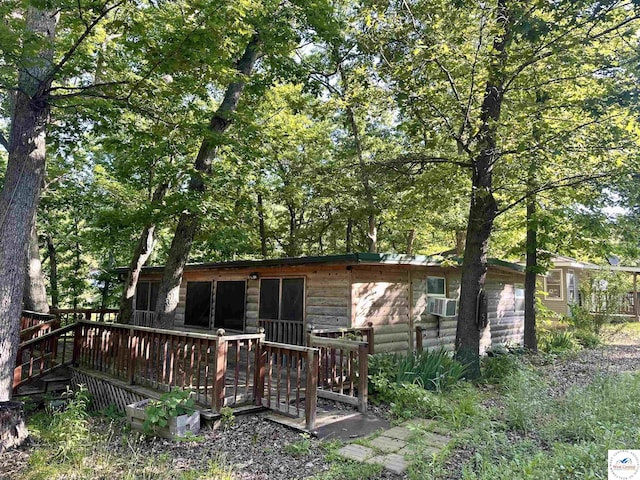 23651 Pifer St, Warsaw, MO 65355 - rear view of property featuring a wooden deck