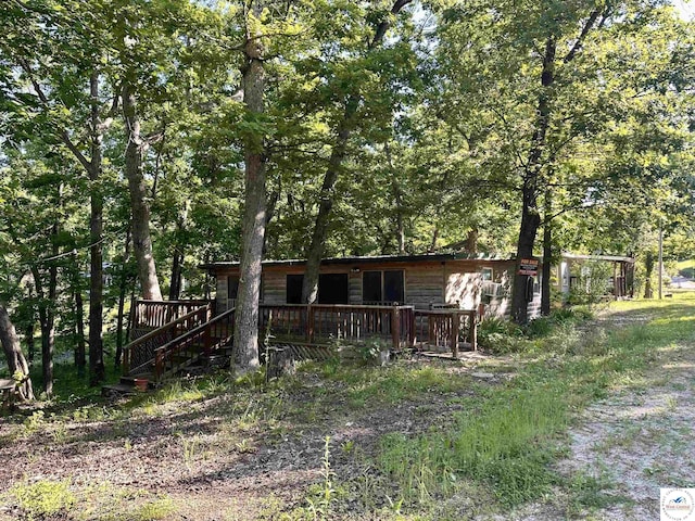 23651 Pifer St, Warsaw, MO 65355 - view of front of home with a wooden deck and stairway