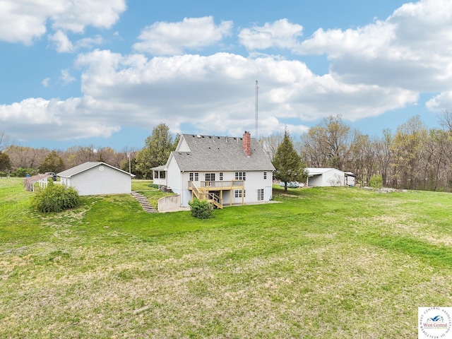 29950 Binder Rd, Green Ridge, MO 65332 - back of property featuring a chimney, a deck, and a lawn