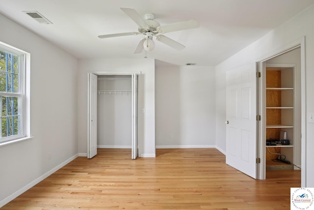 29950 Binder Rd, Green Ridge, MO 65332 - unfurnished bedroom with light wood-style floors, a closet, and baseboards